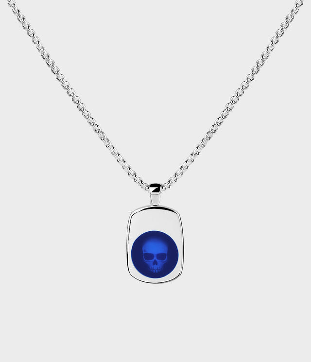 Necklace with a blue enamel skull design on a white background